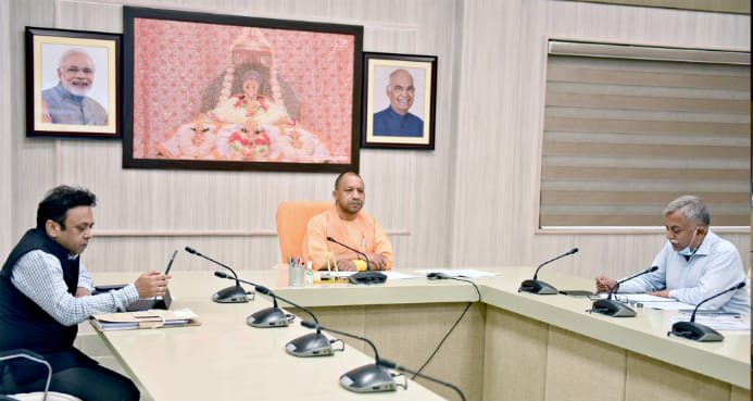 Uttar Pradesh Chief Minister Yogi Adityanath chairing a review meeting on law and order situation in the state