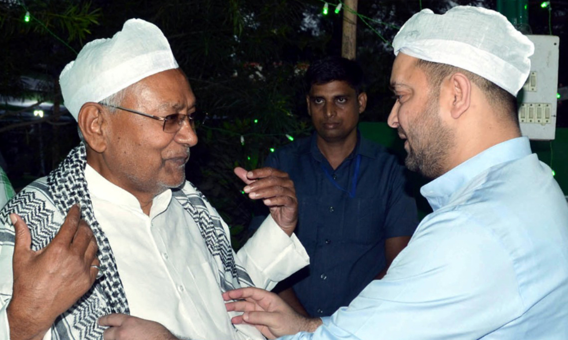 Bihar Chief Minister Nitish Kumar with RJD leader Tejashwi Yadav at an Iftar party