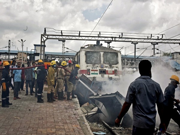 Train set ablaze by protestors protesting against the Agnipath Recruitment Scheme for the Armed Forces, at Secunderabad railway station, Hyderabad