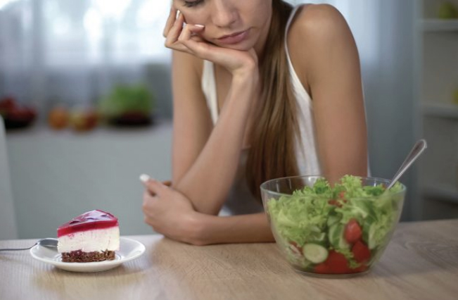 Researchers find cheat meals associated with eating disorders (File Photo)