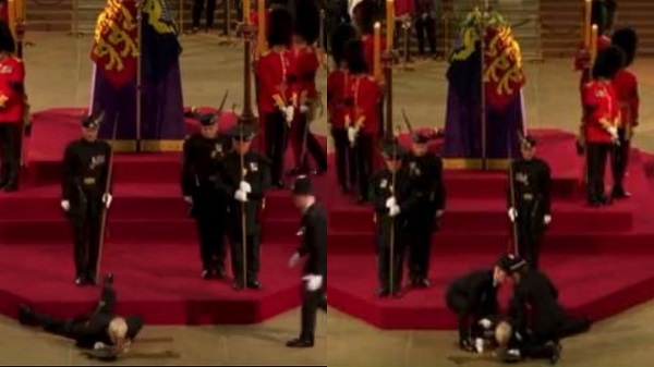 Royal Guard next to Queen Elizabeth's coffin faints