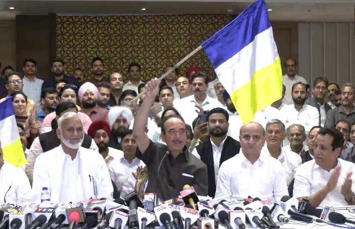Azad unveiling the Party flag