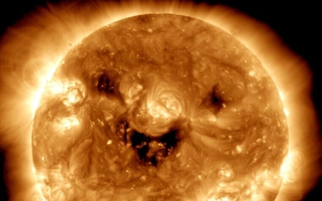NASA's 'smiling' sun image compared to Halloween Pumpkin (File)