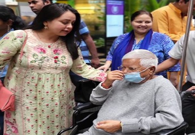 Lalu Yadav and his daughter Rohini Acharya (File)