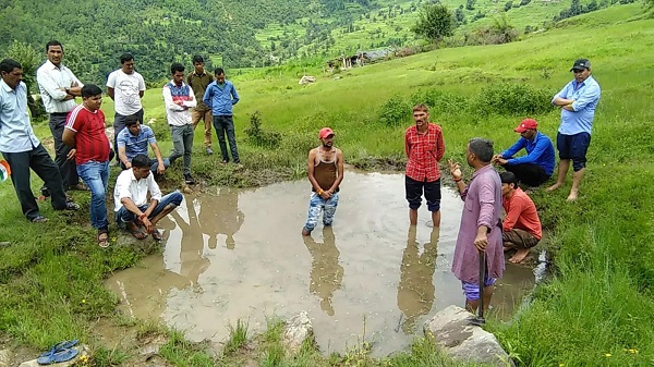 Dwarika Prasad Semwal promoting rainwater conservation and water pits in Chamkot village