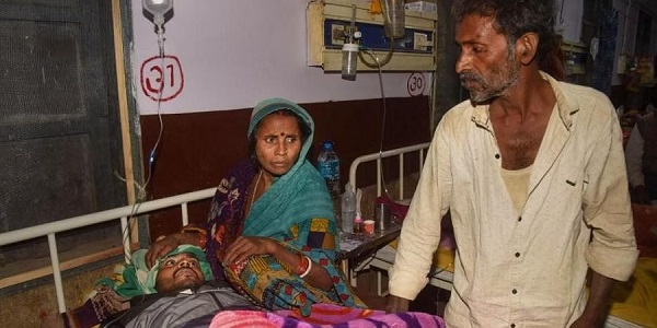 A victim of Saran hooch tragedy being treated in Patna