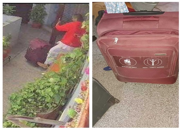 A visual of accused dragging a suitcase