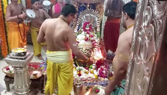 Priests perform rituals at  Mahakaleshwar Temple