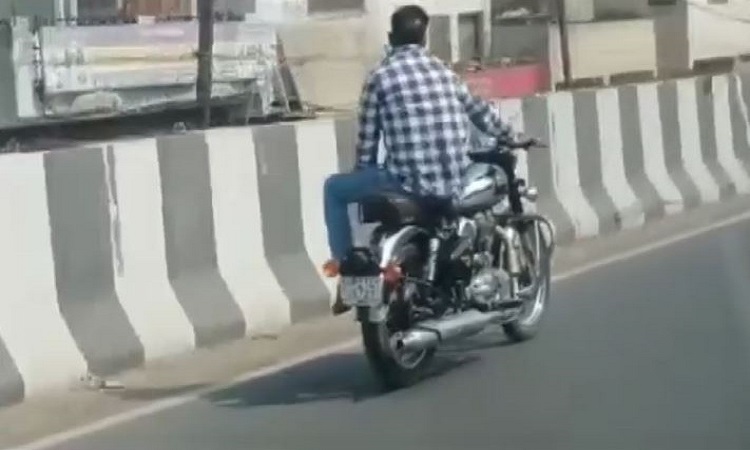 Man performing stunt on a bike in Modarabd