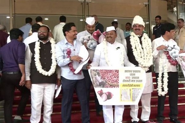 NCP MLAs turn up with onion garlands at state Assembly