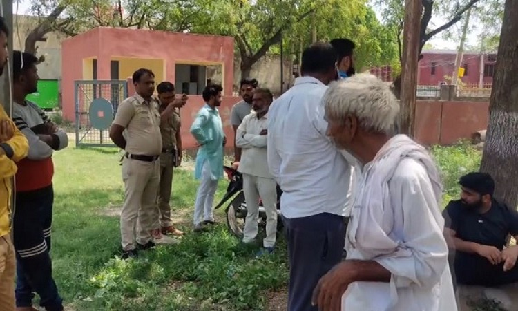 Locals and police outside hospital after the incident in Gurugram