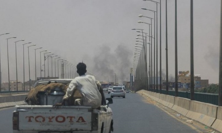 Smoke rises near Halfaya Bridge between Omdurman and Khartoum North in Sudan