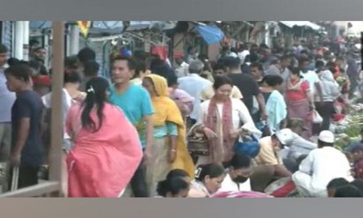 People throng the Tuesday market during curfew relaxation in Imphal Valley