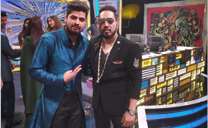 Raja Adam with Singer Mika Singh