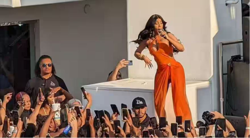 Cardi B throws microphone on fan during her performance