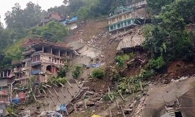Buildings collapsed due to landslides in Kullu's Anni town