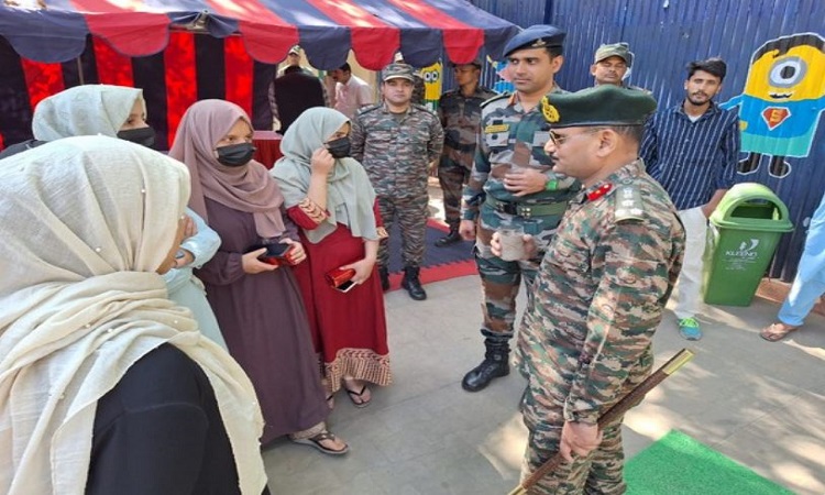 Army officials with students