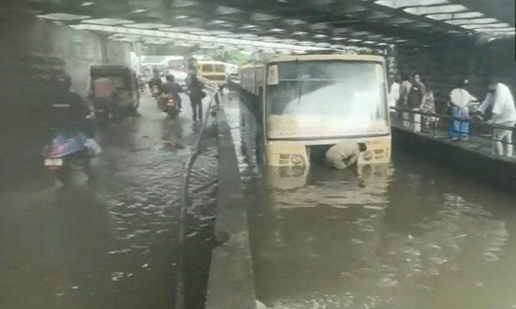 Bus submerged in water in Moolakkothalam
