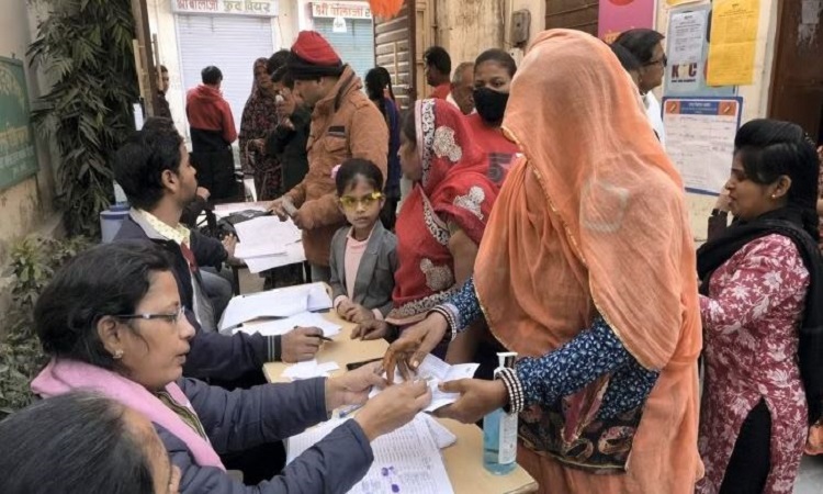 Voters go through the election procedures to cast their votes