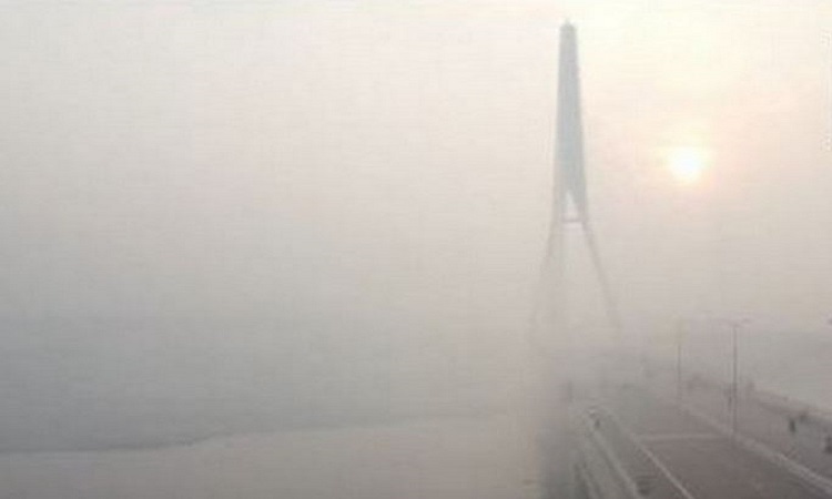 A layer of haze over Signature Bridge