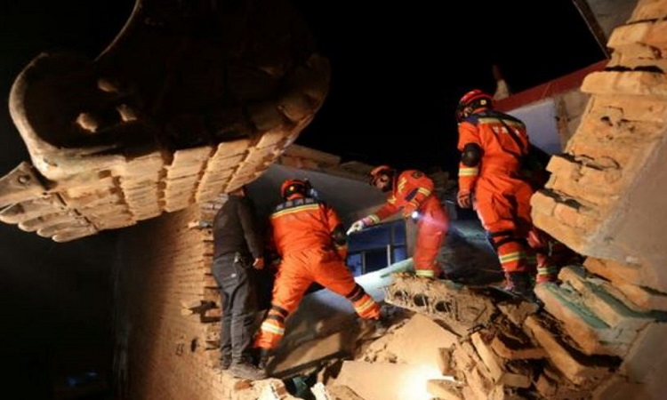 Rescuers check the sites after earthquake in China