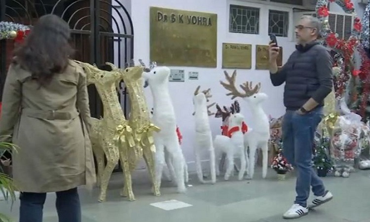 Revellers gear up to celebrate Christmas in Delhi's Khan market