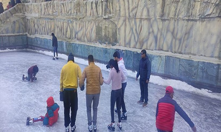 Tourists enjoying Ice-Skating in Shimla