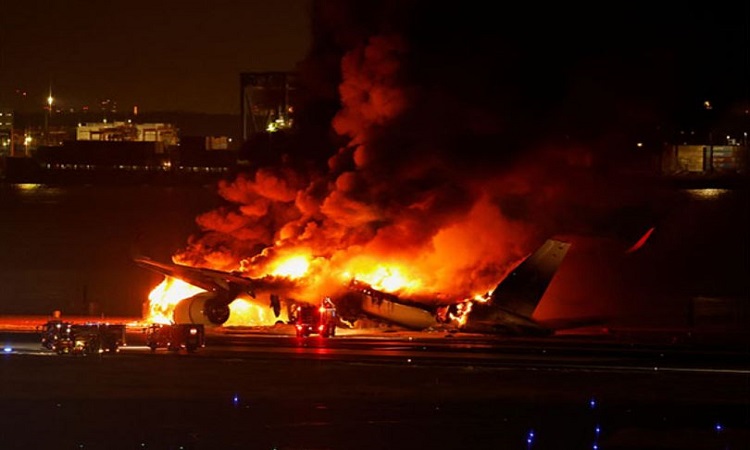 Japanese airplane on fire at Haneda international airport in Tokyo
