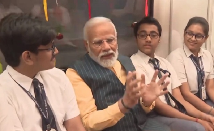 PM Modi travels with school students