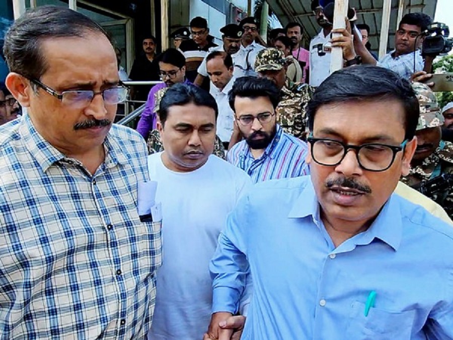 A file picture of Shahjahan Sheikh escorted by CBI officials after a medical examination