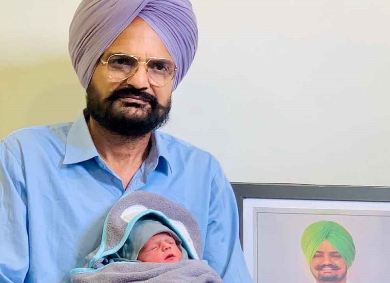 Balkaur Singh with newly born child