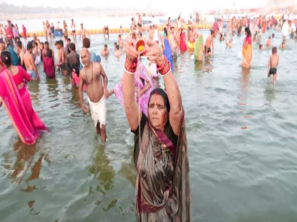 Devotees offer prayers on Somvati Amavasya in Prayagraj