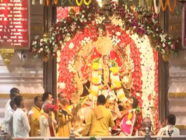 Morning Aarti being performed on the seventh day of Navratri at Chhattarpur Temple