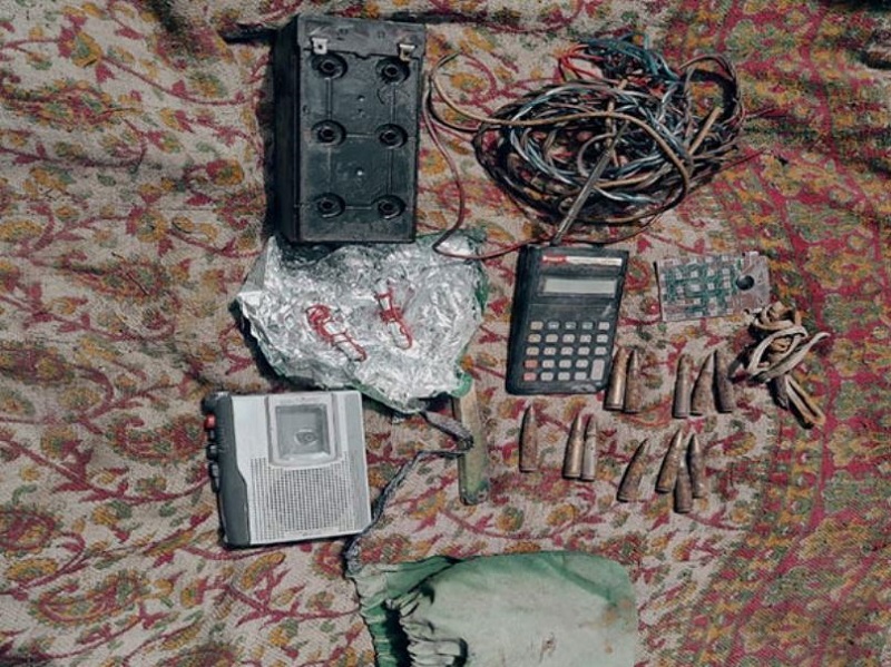 Recovered arms and ammunition from the terrorist hideout