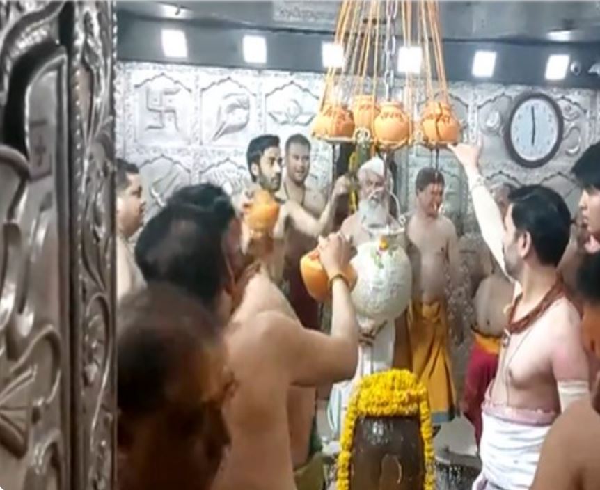 Earthen pots being tied in the sanctum sanctorum in Mahakal Temple