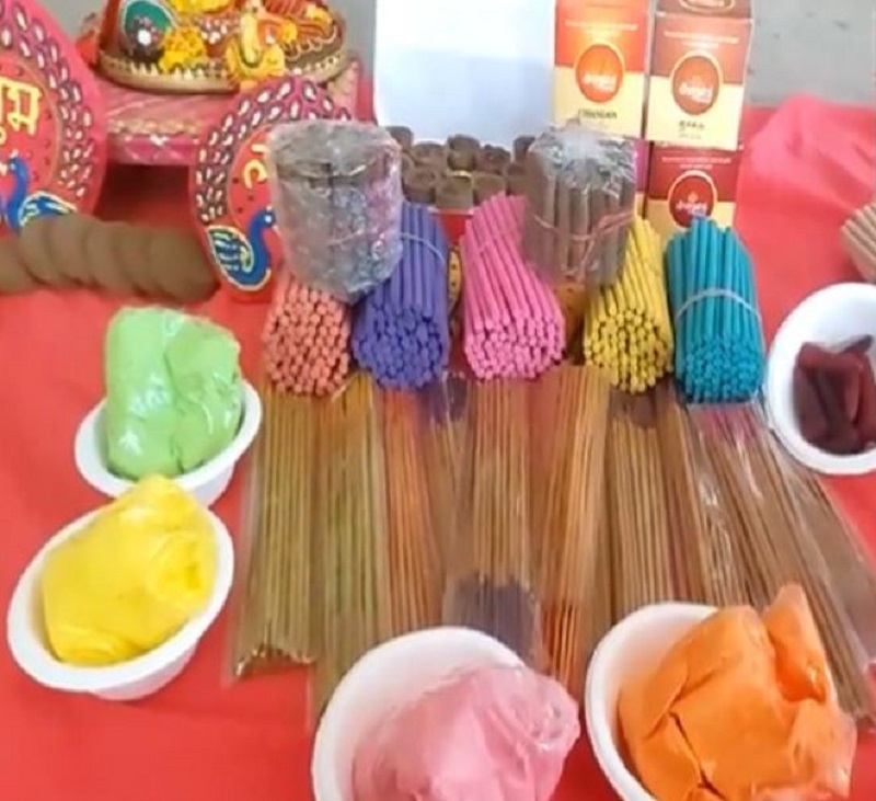 Different types of incense sticks and gulal prepared from flowers